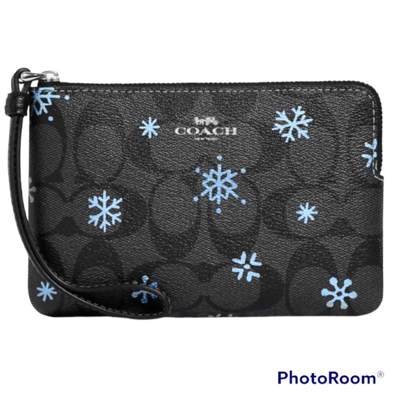 Coach Handbags - SOLD Coach Snowflake Corner Zip Wristlet in Signature Canvas
